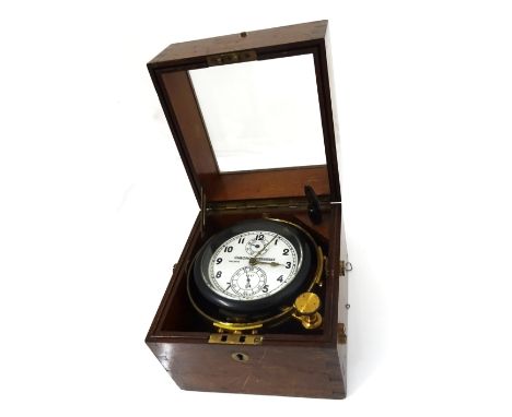 A GERMAN TWO DAY MARINE CHRONOMETERBy Chronometerwerke, Wempe, HamburgThe 12cm compass cased in black bakelite and gimble mou