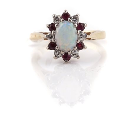 AN 18CT GOLD, OPAL, RUBY AND DIAMOND OVAL CLUSTER RINGClaw set with the oval opal within a surround of alternating circular c