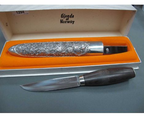 Norwegian Helle Fabrikker Hunting/Fishing Knife, in a metal embossed scabbard in Gjende of Norway box.