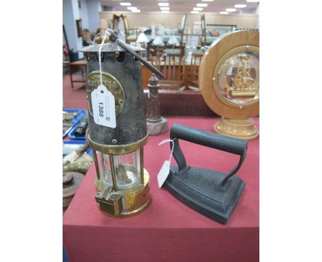 Miners Lamp, The Protector, Eccles, Prestwich Patent brass based, 24cm high with handle down, flat iron (2).