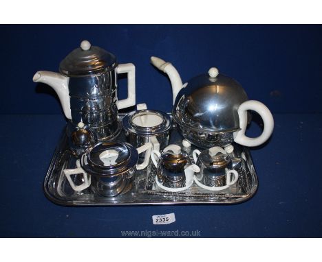 A plated tray, a quantity of Heatmaster including teapot, coffee pot, sucrier, etc. and two miniature pieces including teapot