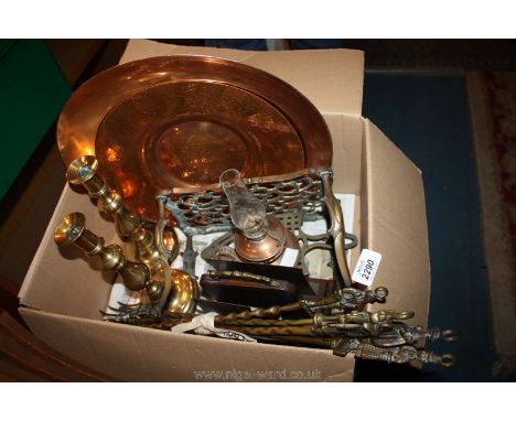 A pair of Brass Candlesticks, letter rack, trivets, small oil lamp, toasting forks and poker, hammered copper plate and coppe