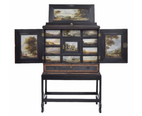 Fine Flemish ebonised cabinet on stand, Antwerp 17th century, the rectangular hinged top enclosing a paper lined interior and