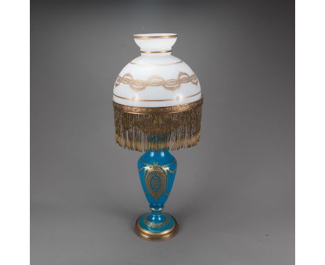 Opal glass lamp, with gilded decorations, glass fringes mid 19th Century. Not electrified. 66 cm high.