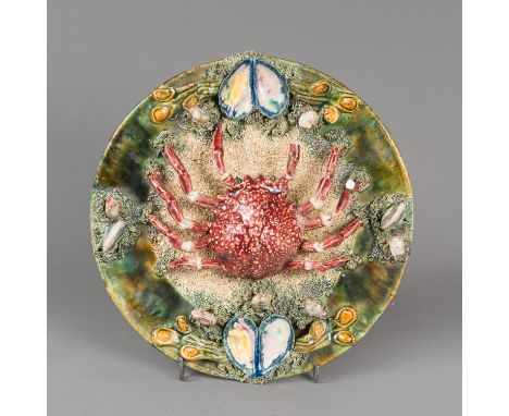 Ceramic dish in Palissy manner. Damages. 28 cm diameter.