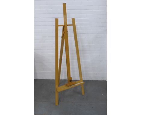 An artists easel, 58 x 169cm. 