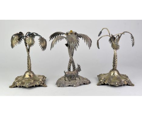 A pair of Victorian silver plated palm tree centre pieces, each on domed bases, with scrolling feet, marks for Henry Wilkinso