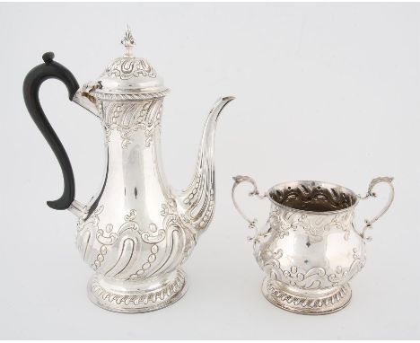 Victorian embossed silver coffee pot with ebonized handle, and sugar bowl, by Harrison Brothers & Howson Sheffield 1900, 39.2