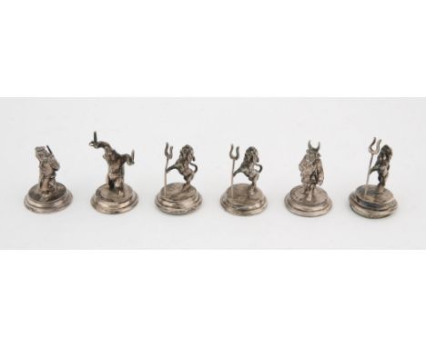 Set of six continental white metal menu / place card holders, three in the form of rampant lions, bull carrying a key, lion w