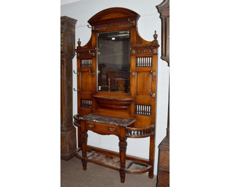 An aesthetic movement mirrored marble topped oak hall stand, 125cm by 225cm.  All components original. Some hooks loose and o