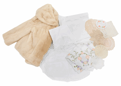 A blonde mink cropped fur evening jacket, assorted textiles and linens comprising embroidered table cloths, others with croch