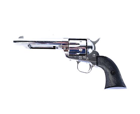 A vintage RMI Single Action Western Blank Firing Revolver, Army .45, Model 1874, chromed body, with black plastic cross hatch