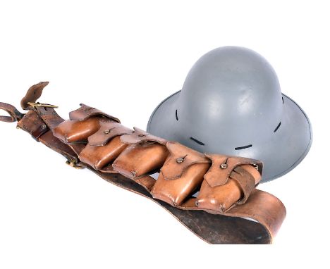 A WWII British Zuckerman helmet by Pressed Steel Company, based in Oxford, dated 41, together with a WWII period W B &amp; Co