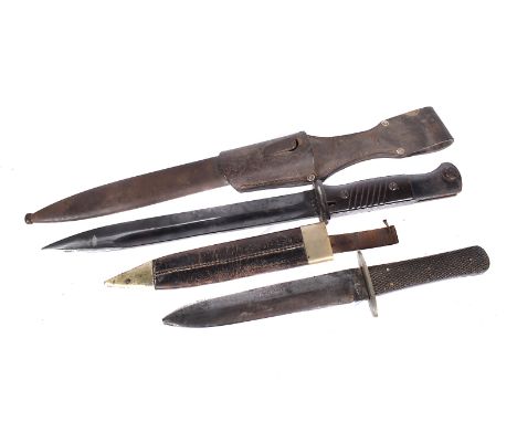 A WWII German K98 bayonet and scabbard by E.U.F Horster, dated 1940, with serial 5376, complete with scabbard and maker stamp