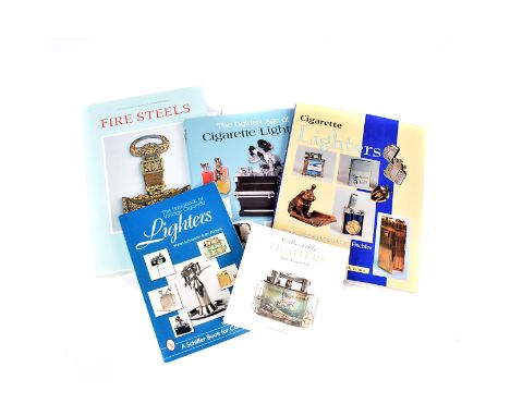 A group of four Lighter Reference books, to include Collectible Lighters by Juan Manual Clark,  The Handbook of Vintage cigar