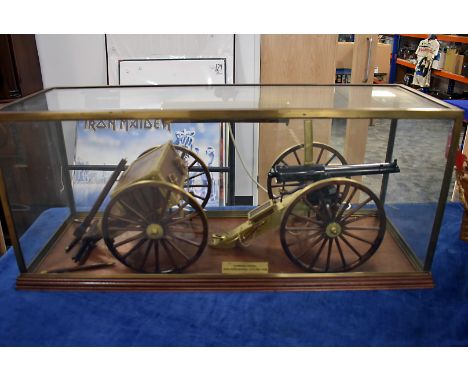 A fine scratch built working model of a 1903 Four Barrel Gatling Gun, in wood with brass fittings, the gun with working actio