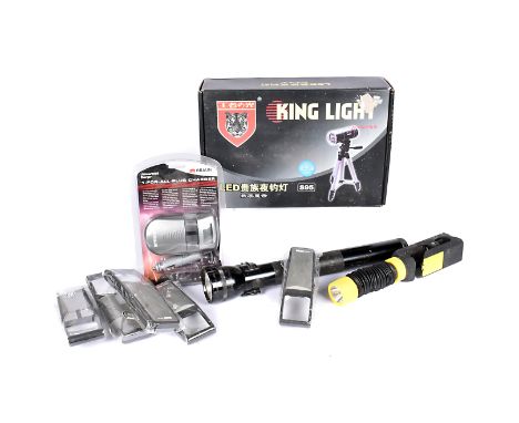 A Light Light LED fishing light with tripod, in retailers box, together with a large maglite, five unused inspection glasses/