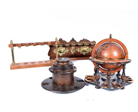 An assortment of Pipe stands, to include an example in the form of a antique globe (parcel) 