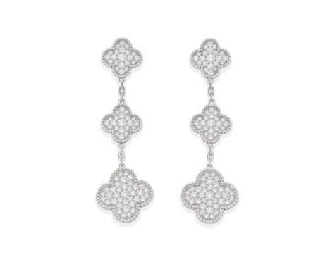 VAN CLEEF &amp; ARPELS: PAIR OF DIAMOND 'MAGIC ALHAMBRA' PENDANT EARRINGSEach with three quatrefoil motifs, set throughout wi