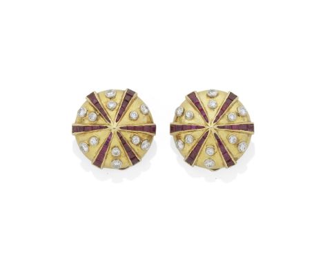 GAZDAR: RUBY AND DIAMOND EARRINGS, MID 20TH CENTURYEach designed as the head of a parasol, with spokes of calibré-cut rubies 