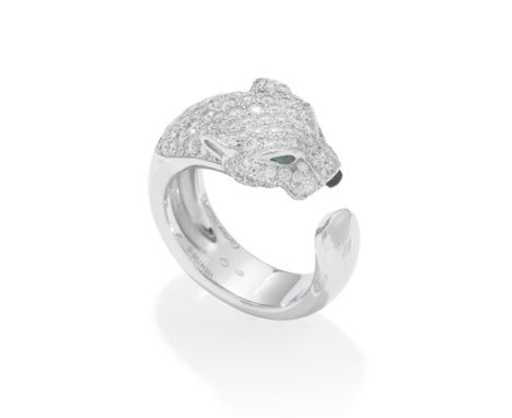 CARTIER: DIAMOND AND GEM-SET 'PANTHERE' RINGThe panther's head pavé-set with brilliant-cut diamonds, pear-shaped emerald eyes