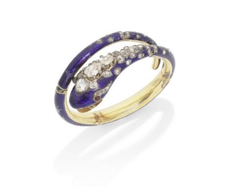 ENAMEL AND DIAMOND SERPENT BANGLE, CIRCA 1845The hinged body decorated with Royal blue enamel, the head and tip of the tail s