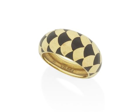 CARTIER: GOLD AND ENAMEL RING, 1974The tapering band, decorated around the finger with black enamel and yellow gold repeating