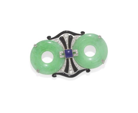 ART DECO JADE AND GEM-SET BROOCH, CIRCA 1925The jade discs accented by rose-cut diamond claws and black enamel scrolls with f