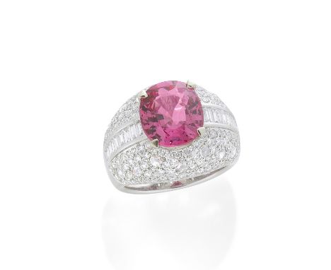SPINEL AND DIAMOND DRESS RINGThe cushion-shaped pink spinel, weighing 4.99 carats, within a bombé mount set throughout with b