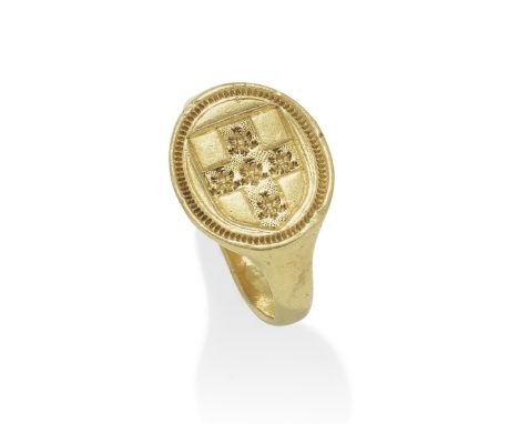 GOLD MERCHANT'S RING, 15TH CENTURYThe oval plaque with an engraved heraldic shield, within an incised border, goldsmith's mar