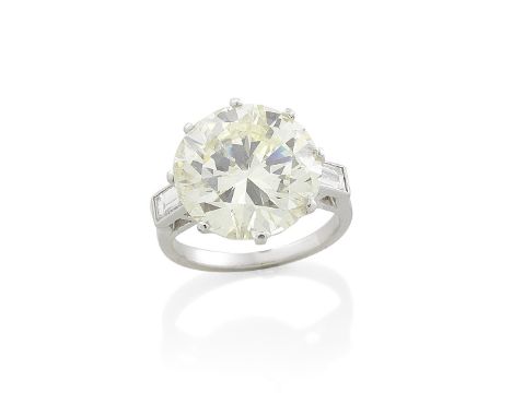 DIAMOND SINGLE-STONE RINGThe brilliant-cut diamond, weighing 10.17 carats, between baguette-cut diamond shoulders, ring size 