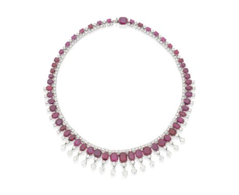 RUBY AND DIAMOND FRINGE NECKLACESet throughout with a graduation of octagonal step-cut rubies, between brilliant-cut diamonds