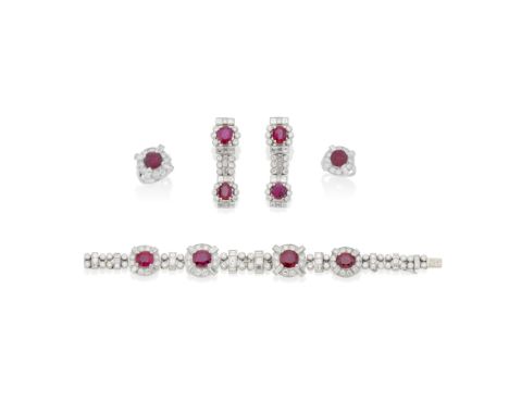 RUBY AND DIAMOND BRACELET, RING AND PENDENT EARRING SUITEThe articulating brilliant and step-cut diamond links accented by fo