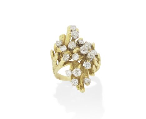A DIAMOND-SET DRESS RING, CIRCA 1965Designed as a textured spray decorated with old brilliant, brilliant, and single cut diam
