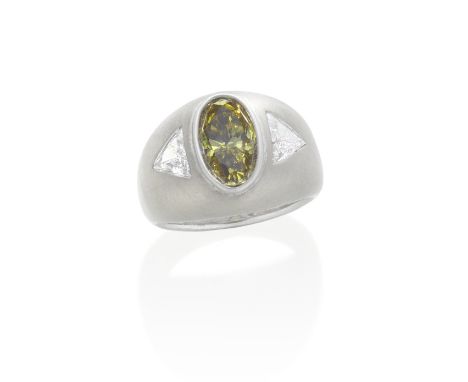 FANCY-COLOURED DIAMOND AND DIAMOND RINGThe Fancy Dark Brown-Greenish Yellow oval-cut diamond, weighing 2.33 carats, between t