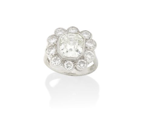 DIAMOND CLUSTER RINGThe central Asscher-cut diamond, weighing 3.66 carats, within a surround of brilliant-cut diamonds, mount