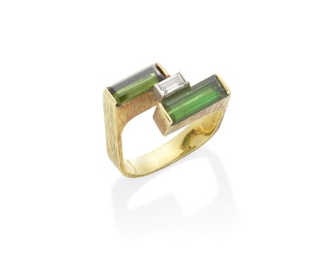 GRIMA: GOLD, TOURMALINE AND DIAMOND RING, 1984Set with two baguette-cut tourmalines and a central baguette-cut diamond, withi