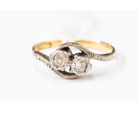 An 18ct gold two stone diamond dress ring, size I