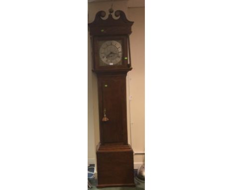 A George III oak 30 hour longcase clock, by Thomas Ramsbottom Newmillerdam. (Wakefield Yorkshire) 12 inch brass, dial, Roman 