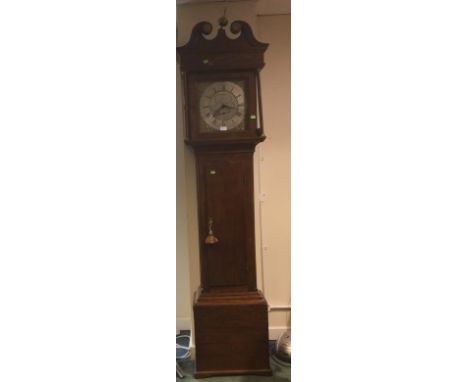 A George III oak 30 hour longcase clock, by Thomas Ramsbottom Newmillerdam. (Wakefield Yorkshire) 12 inch brass, dial, Roman 