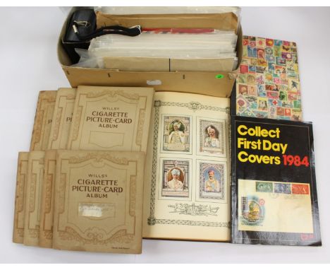 A small collection of seven Wills's Cigarette card albums, a box of First Day Covers, Lord Roberts Memorial Fund Stamp album 