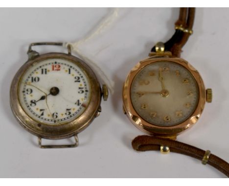 A ladies circa 1920s 9ct gold wristwatch, on cord strap. approx dial diameter 25mm, together with a silver cased wristwatch w