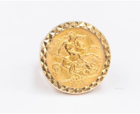 A 1911 half sovereign ring set into a 9ct gold demountable casing, gross weight approx 9.6 gms