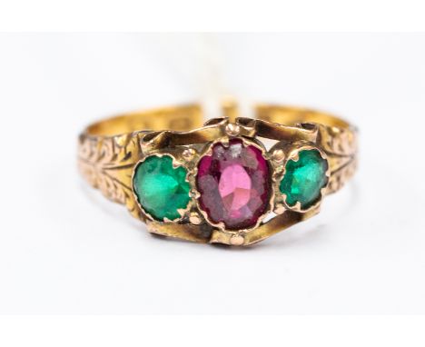 A Victorian paste set ring, 22 ct gold, size L, set with green and purple paste, dated 1873,  total gross weight approx 1.7 g