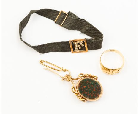 A 9ct swivel fob set with bloodstone and carnelian, an 18ct yellow gold ring with decoration to the top, size N, weight appro