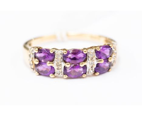An amethyst and diamond set 9 ct gold ring