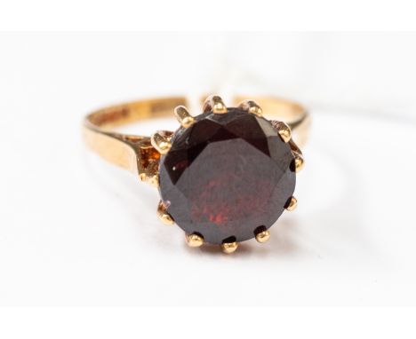 A 9ct garnet dress ring, round garnet claw set, size L, total gross weight approx 3gms