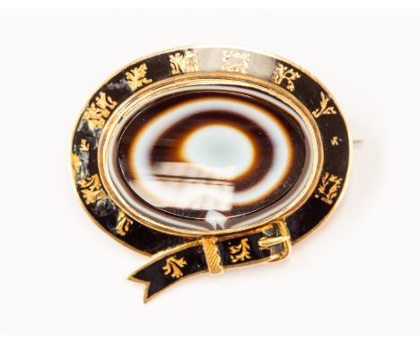 A Victorian enamel and banded agate brooch, in the form of a buckle, oval agate set to the centre with an enamel decorative b