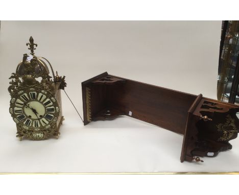 An early 20th Century brass cased lantern clock, in the 18th Century style, by AD Mougin, the face with ceramic numerals, eig