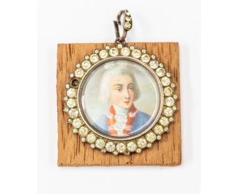 A portrait miniature with depicting a stylised Nelson, paste set mount together with a piece of wood bearing the note "from t